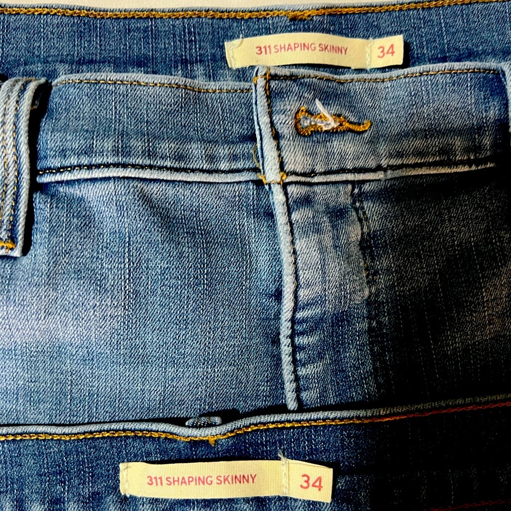 Two women’s Levi’s jeans size 34.
